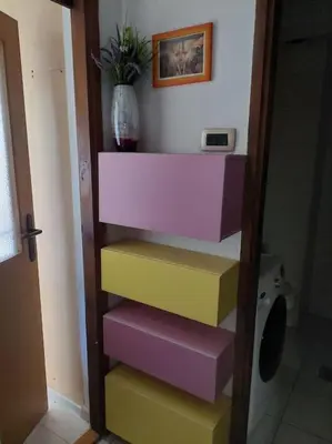 a bunch of colorful steps in a bathroom at Modern 1-bedroom condo with free parking & fast WiFi in Podgorica