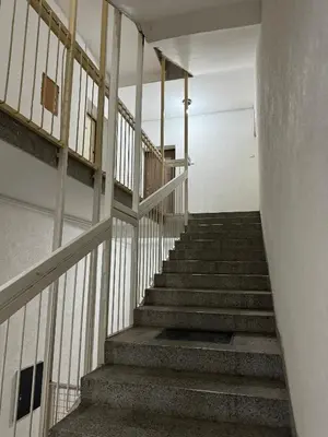 a staircase in a building with a stair case at Eleven in Podgorica