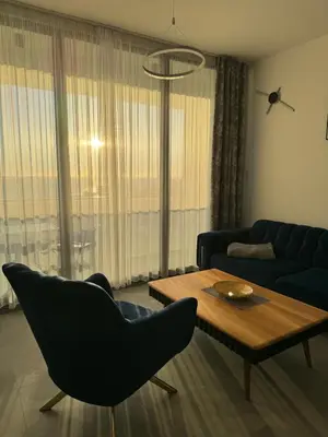 a living room with a couch and a table at Luxury Ocean View in Ulcinj