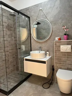 a bathroom with a sink and a shower at Luxury Ocean View in Ulcinj