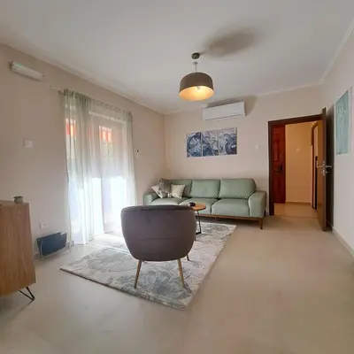 a living room with a couch and a table at Bubi in Kotor