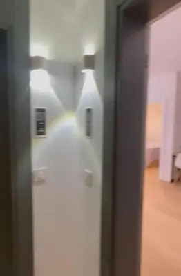 a door with a white bottle in a room at DH Horizon Residences in Budva