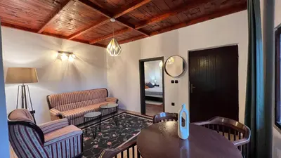 a living room with a couch and a table at Villa Concordia in Budva