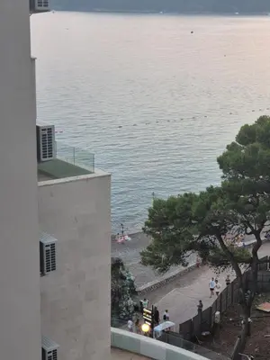 a view of a body of water from a building at Rafailovici Beachfront Apartment 2 in Budva
