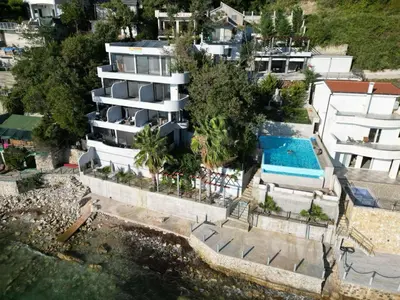 an aerial view of a hotel with a swimming pool at ALOHA Beach front Vacation Rental in Ulcinj