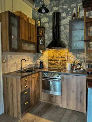 a kitchen with a sink and a stove at Holiday home Zlatna Glavica in Podgorica