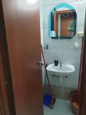 a bathroom with a sink and a mirror at Montenegrinbeautystar in Bar