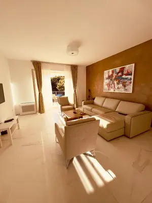 a large living room with a couch and chairs at Most Oliva Resort Budva in Budva