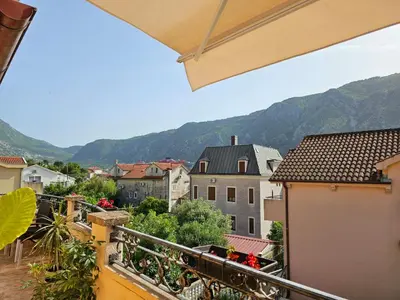 a view of a city from a balcony at Apartments Carpe Diem in Kotor