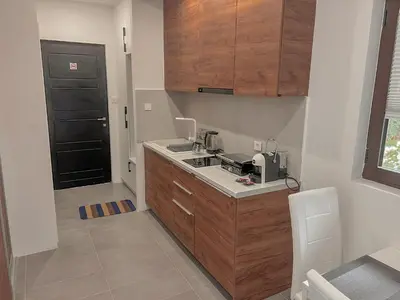 a kitchen with a sink and a counter top at Absolute Adriatic in Kotor