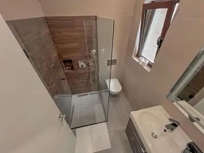 a bathroom with a shower and a sink at Absolute Adriatic in Kotor