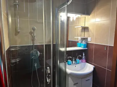 a bathroom with a shower and a sink at Mik Apartments Heart of Budva 1 plus 1 40 SqMeter in Budva