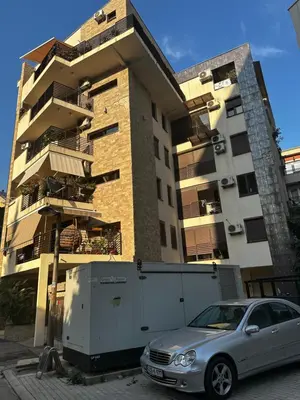 a car parked in front of a building at Mik Apartments Heart of Budva 1 plus 1 40 SqMeter in Budva