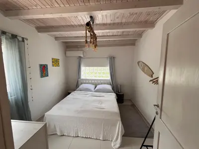 a small bedroom with a bed and a window at Sailors Home Stari Bar in Bar