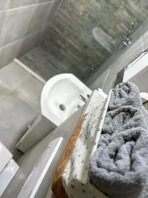 a bathroom with a sink and a towel on a counter at Sea Star in Bar