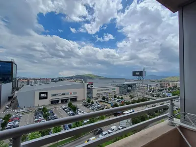 an aerial view of a parking lot with cars at Apartman City kvart pg in Podgorica
