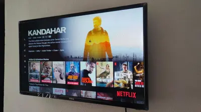 a flat screen tv hanging on a wall at Lula Apartments in Ulcinj