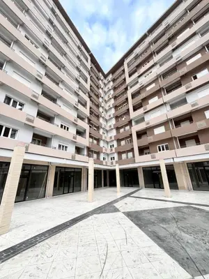 a large apartment building with a lot of windows at APART 28- Luxury suites in Podgorica