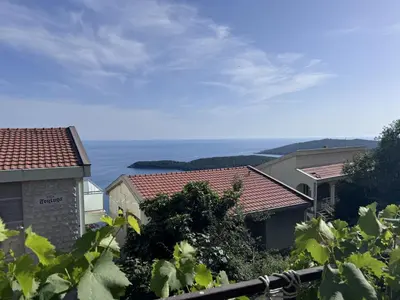 a view of the ocean from a house at Villa Happy Family in Seoca