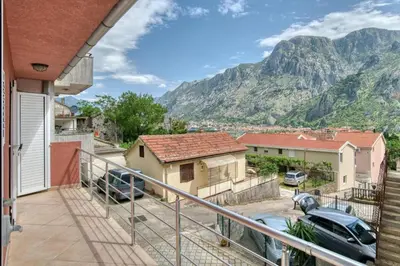 a balcony with a view of a mountain at Underhill Royal View in Kotor