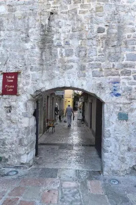 an alley in a stone building with an archway at PERFECT OLD TOWN SPOT in Budva in Budva