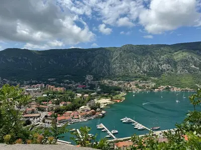 a view of a harbor with boats in the water at Sea Glass Kotor Bay in Škaljari