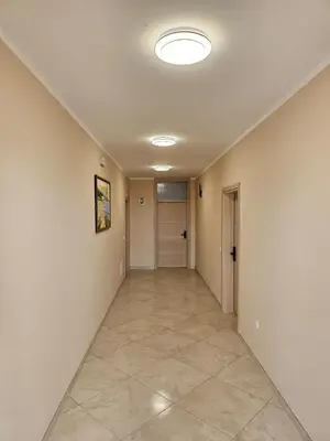 a hallway in a house with a ceiling at Kristina lux apartment in Bar