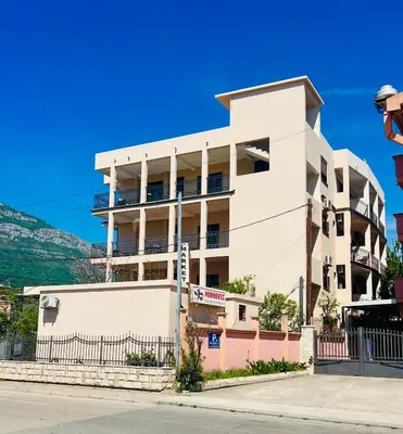 a white building on the side of a street at Kristina lux apartment in Bar