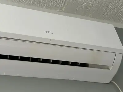 a white video game system sitting on a table at My Choice in Budva