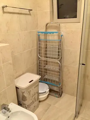 a bathroom with a toilet and a sink at Studio Prima-Modern Cozy Studio, 4 min to Beach in Pržno