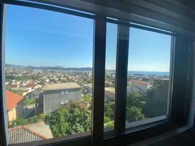 a view of a city from a window at Apartmani Knezevic in Bar
