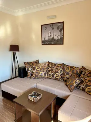 a living room with a couch and a table at Casablanca in Sutomore