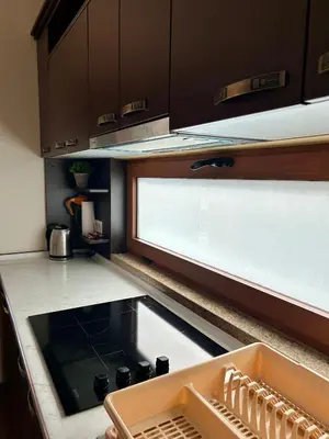 a kitchen with a stove and a sink in it at Casablanca in Sutomore
