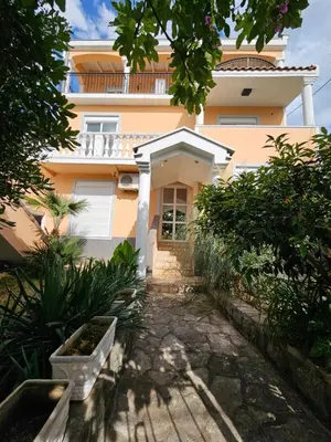 a house with a pathway in front of it at Villa Amela Dubrava in Bar