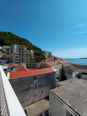 a view of a city with the ocean in the background at Beli angel in Rafailovici