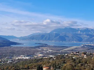 a view of a city and a body of water at Village House DIMS in Kotor