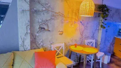 a room with a table and a table and chairs at Centre Budva Green in Budva