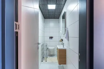 a bathroom with a toilet and a sink at Royal Oasis Seaview - Sveti Stefan in Sveti Stefan