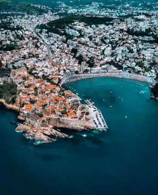 an aerial view of a town on the water at Ulcinj - Stonehouse in Oldtown with sea view in Ulcinj
