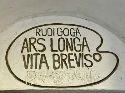 a sign that says rufijioco arts loma vita breyssosa at Ulcinj - Stonehouse in Oldtown with sea view in Ulcinj