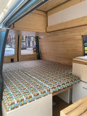 a bed in the back of a camper van at GoCamping Montenegro in Cetinje