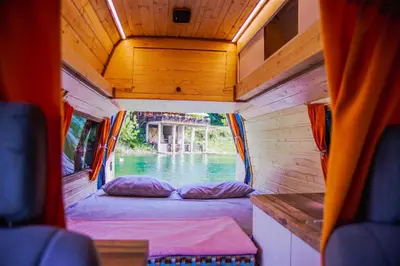 a view of a bed in the back of a rv at GoCamping Montenegro in Cetinje
