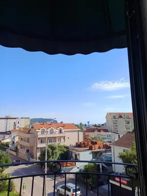 a view of a city from a balcony at Sea breeze Budva in Budva