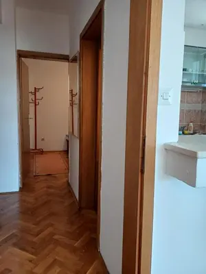 a hallway with an open door to a room at Sea breeze Budva in Budva