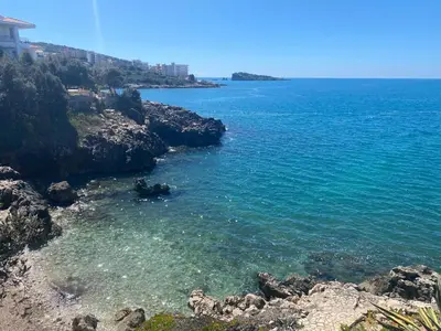 a view of the ocean from a cliff at Apart Yukka first line in Utjeha