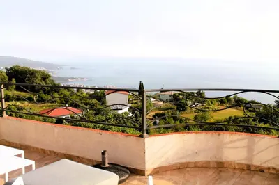 a balcony with a view of the ocean at Mantra HOME in Bar