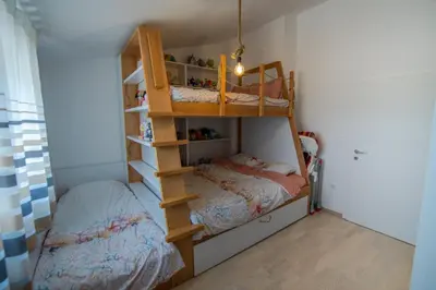 a bedroom with two bunk beds and a bed at Mantra HOME in Bar