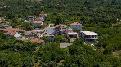 a group of houses on top of a hill at Mantra HOME in Bar
