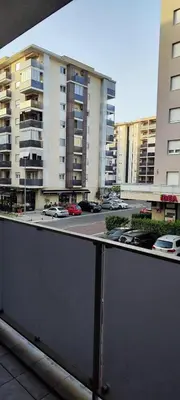 a view of a parking lot in a city with buildings at Vacation Apartment City Kvart in Podgorica