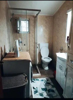 a bathroom with a shower and a toilet at Bgd 2 apartman in Kotor